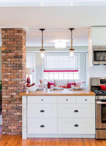 Feature pillar with reclaimed red brick in a kitchen - Oasis Outdoor Living